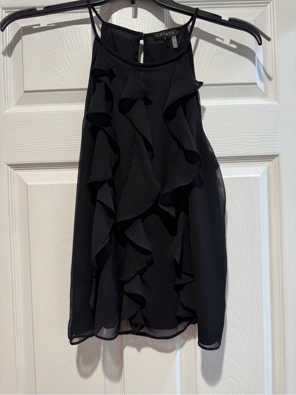 1. STATE Black Ruffle Halter Shell